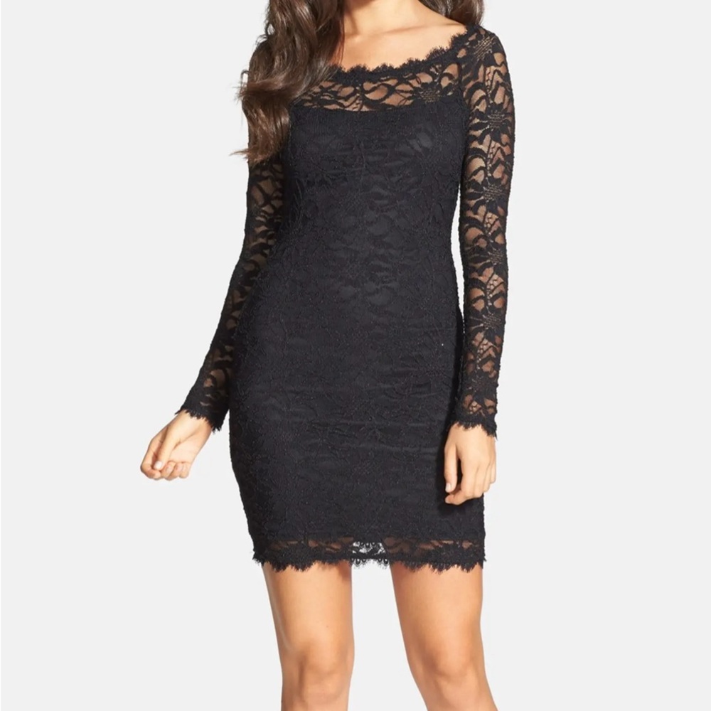 Black fitted cocktail dress.